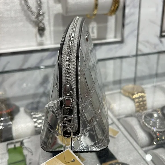 Michael Kors Empire Sm Metallic Crocodile Embossed Leather Travel Pouch
Silver - Picture 3 of 16